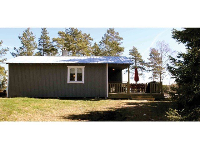 Seaside Villa med altan och havet i bakgrunden